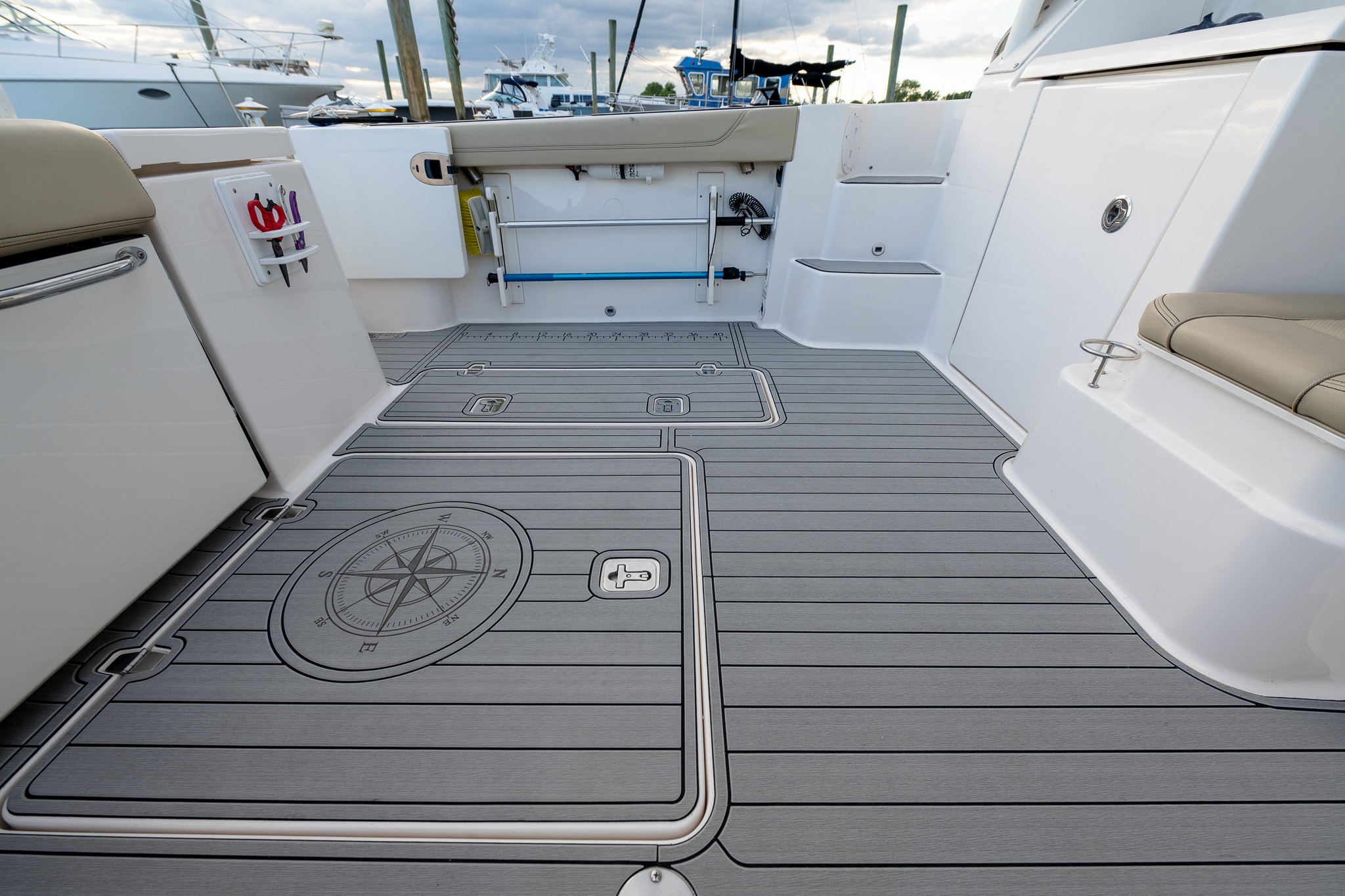 Pursuit EVA flooring compass logo