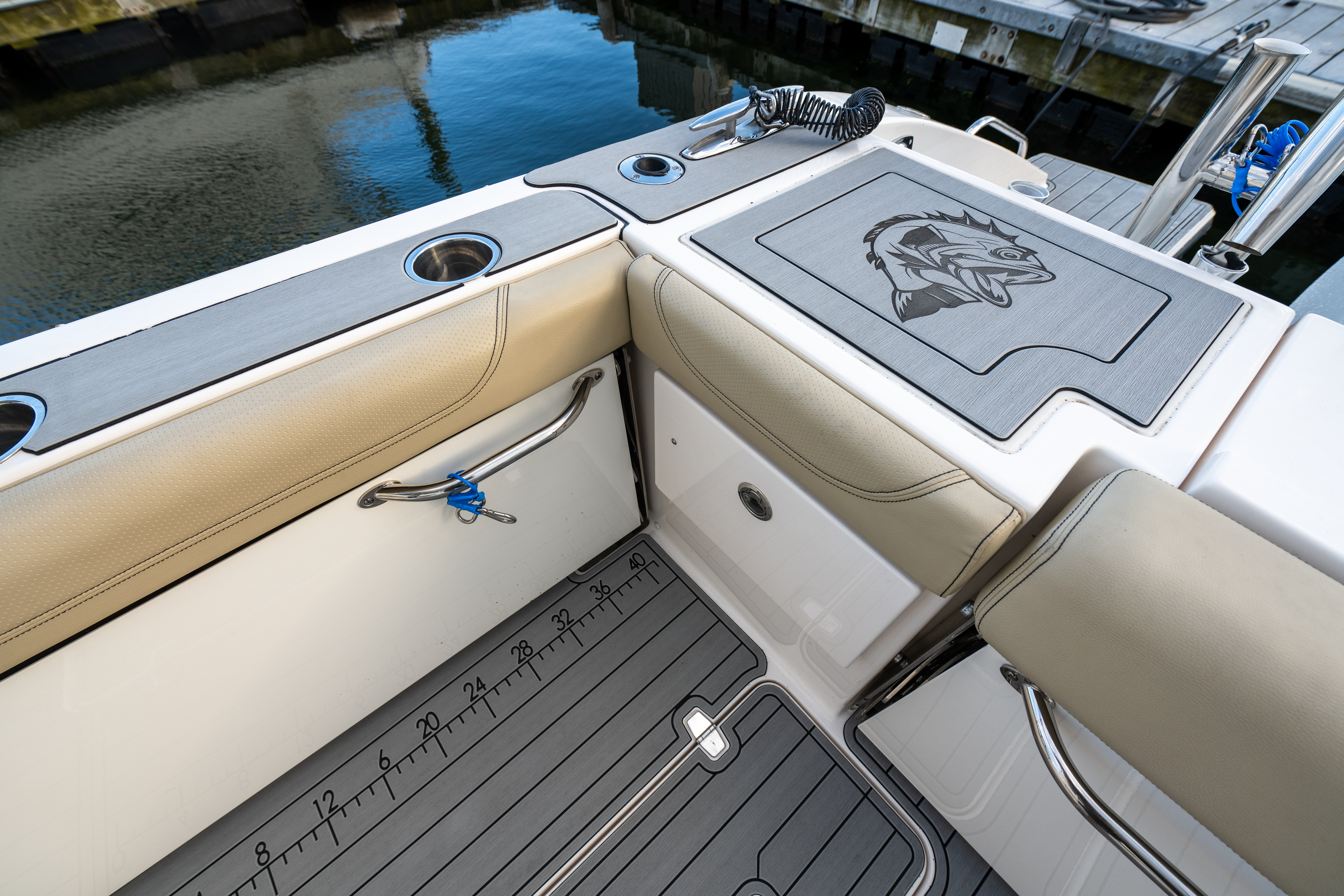 Pursuit EVA flooring fish logo ruler detail